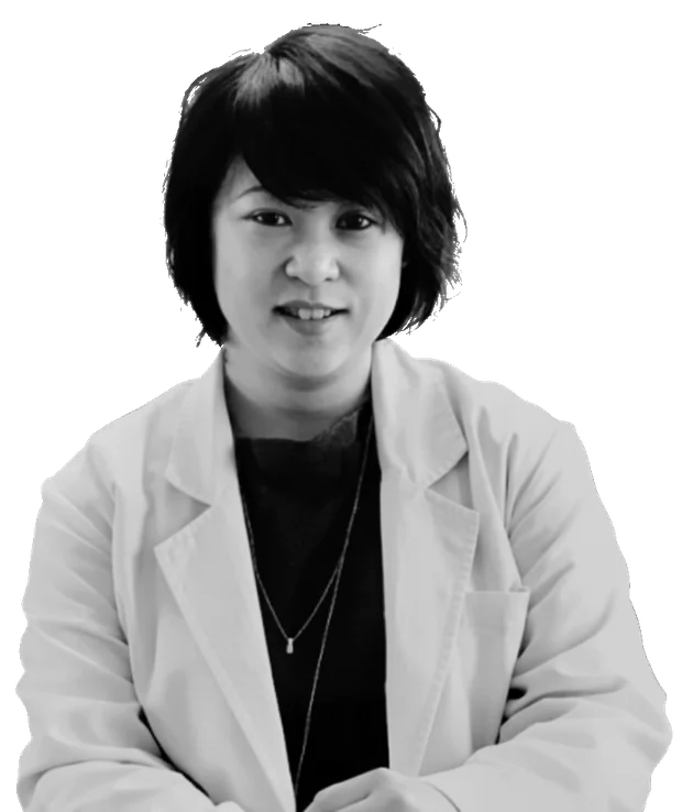 Dr. Deborah Ma in her white clinic coat